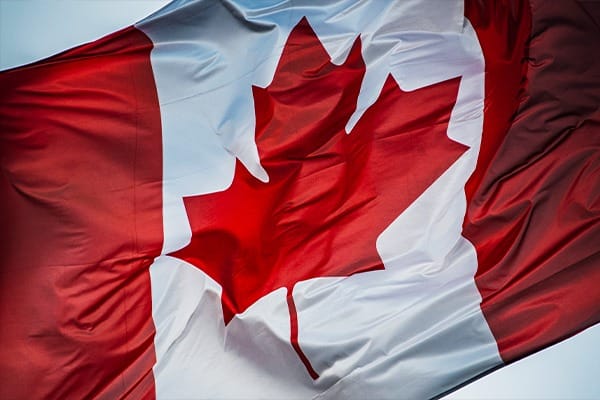 Navigating Choppy Waters: Canada-India Tensions Impact Immigration Processing - Canadian Flag